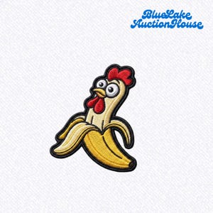 May include: An embroidered patch featuring a cartoon chicken head emerging from a peeled yellow banana. The chicken has a red comb and wattle, large white eyes with black pupils, and a yellow beak. The text BlueLake AuctionHouse is visible.