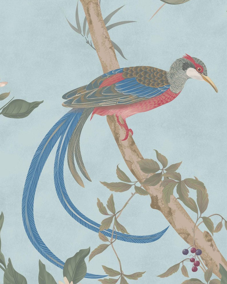 May include: A detailed illustration of a bird with long blue tail feathers perched on a tree branch. The bird features red, blue, and gray plumage, with a long yellow beak. The background is a light blue with leaves and branches.