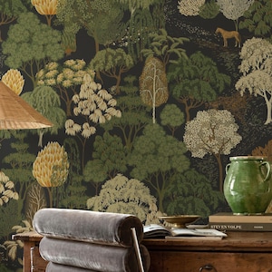 May include: Wallpaper featuring a dark background with a dense forest pattern of various trees in shades of green, gold, and cream, including a small horse figure. The design includes stylized foliage and textured tree shapes across the surface.
