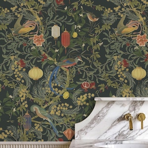 May include: Dark green wallpaper featuring a detailed botanical design with birds, lanterns, and fruit. The pattern includes yellow, red, and blue birds perched among branches with yellow flowers and pomegranates. The wallpaper has a vintage aesthetic.