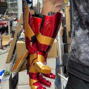 iron man hands mark 42 helmet Voice-Controlled Transforming Gauntlet  StarCine Collectible costume builds Iron Man Mask, Mark 42