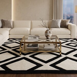 May include: A modern living room featuring a cream-colored sectional sofa, a geometric black and white rug, and a glass-topped coffee table. The room has a neutral color palette with a floor lamp and a view of the city.