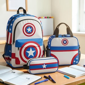 a collection of school supplies, including a backpack, a lunch bag, a pencil case, and some books, all with a patriotic design.