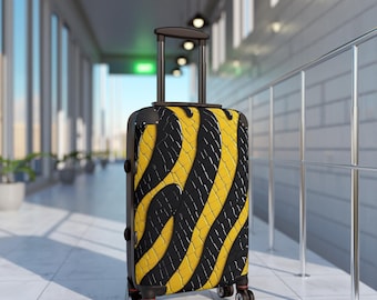 Maleta de cabina rígida con estampado de olas negras y amarillas