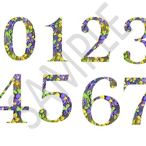May include: A set of numbers from zero to seven, each decorated with a floral pattern. The flowers are purple, yellow, and green, set against a textured, gray background. The numbers are displayed on a white background.