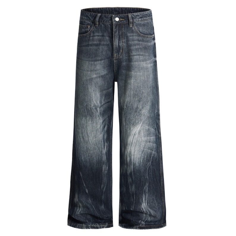 May include: Dark wash denim jeans with a wide leg design. The jeans have a button and zipper closure, classic five-pocket styling, and a faded, distressed appearance. The denim is a medium weight, suitable for various seasons.