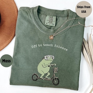 Camiseta de profesor de ciencias con colores cómodos, camiseta de profesor de ciencias, camiseta de regreso a clases, camiseta divertida de agradecimiento al profesor de ciencias con la rana que se va a enseñar