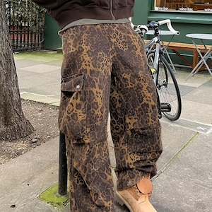 Y2K Leopard Print Cargo Pants – Distressed Animal Pattern Baggy Trousers –Streetwear Cyber Grunge Techwear –Harajuku Wide Leg Tactical Pants