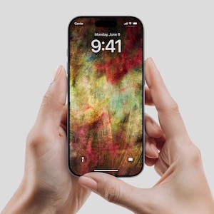 May include: A black smartphone displaying a colorful abstract wallpaper with red, yellow, and green brushstrokes. The screen shows the time as 9:41 AM on Monday, June 6. The phone is held in two hands against a plain background.