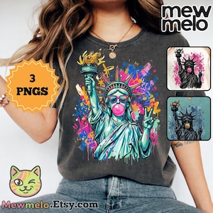 Könnte beinhalten: Dunkelgraues T-Shirt mit einer farbenfrohen Grafik der Freiheitsstatue mit Sonnenbrille und einer Kaugummiblase. Das Design umfasst Graffiti-artige Farbspritzer und den Text "3 PNGS".