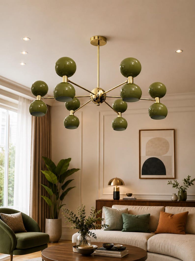 May include: A multi-arm chandelier featuring a central gold-toned metal rod and branching arms that support ten glossy olive green spherical light fixtures arranged in pairs, creating a symmetrical, radial design suspended from the ceiling.