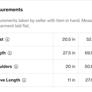 May include: Measurements of a garment, including chest (20.5 in), length (27.5 in), shoulders (20 in), and sleeve length (11 in). Measurements are taken with the garment laid flat.