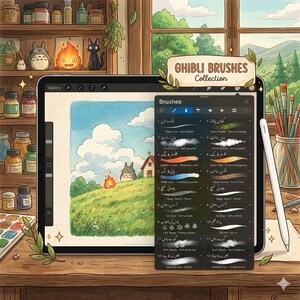 May include: A digital tablet displaying a Ghibli Brushes Collection interface with a brush menu overlay. The screen shows a landscape illustration featuring a grassy hill, clouds, and a small creature. A stylus rests on the wooden desk nearby.