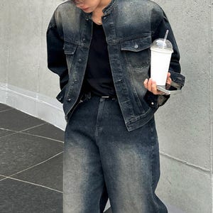 Denim Set Men | Jacket Pants Outfit | Y2K Streetwear Casual Wear

man wearing denim jacket and wide leg jeans styled together for streetwear outfit set