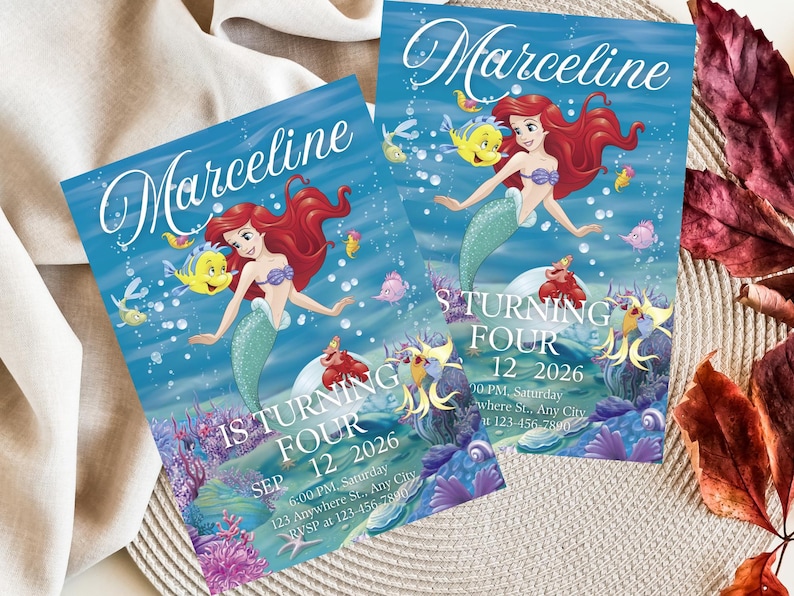 May include: Two invitations featuring a mermaid with red hair, a purple seashell top, and a turquoise tail. The invitations have the name "Marceline" in script and text that reads "1S TURNING FOUR" and the date "SEP 12 2026".