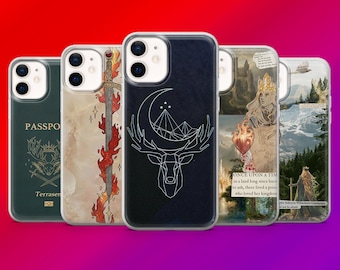 May include: A collection of phone cases with various designs. One case features a deer head with a crescent moon and mountain graphic. Other cases display a sword, a passport design, and a scene with text that reads "ONCE UPON A TIM".