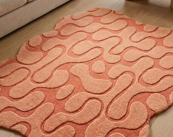 Handmade Tufted Area Rug: Peach Coral Wavy Abstract Design