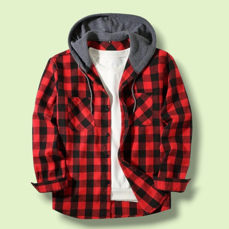 May include: A long-sleeve button-up shirt featuring a red and black buffalo plaid pattern. The shirt includes a gray jersey-knit hood with matching drawstrings and a solid white undershirt layer visible at the center front opening.
