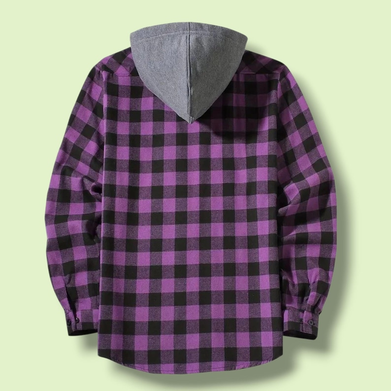 May include: A long-sleeve button-up shirt featuring a purple and black buffalo plaid pattern. The garment includes a solid grey hood attached at the collar, long sleeves with buttoned cuffs, and a straight hemline, shown from the back view.