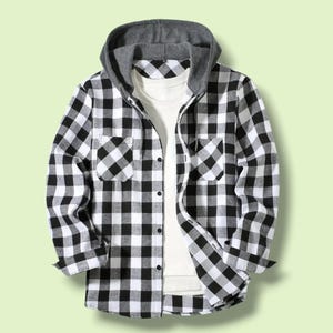 May include: A long-sleeve button-down shirt featuring a black and white buffalo check pattern, two chest pockets, and a solid gray jersey knit hood with matching drawstrings, layered over a plain white crew neck t-shirt.