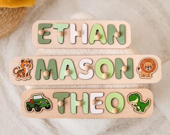 Groene naampuzzel met elementen: dinosaurus, vrachtwagen, leeuw, tijger