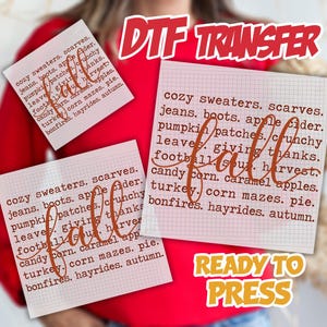 May include: A DTF transfer sheet featuring a grid pattern background with the text cozy sweaters, scarves, jeans, boots, apple cider, pumpkin patches, crunchy leaves, giving thanks, football, harvest, candy corn, caramel apples, turkey, corn mazes, pie, bonfires, hayrides, autumn, with the word fall written in large cursive script.