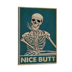 May include: A rectangular wall art print featuring a skeleton with a hand on its cheek, set against a teal background. The words "NICE BUTT" are printed in bold, white letters at the bottom. The artwork has a vintage, distressed look.