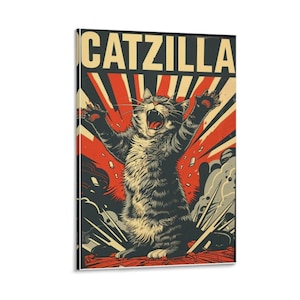May include: A rectangular print featuring a gray tabby cat with its mouth open and arms raised in a roar. The print has the word "CATZILLA" at the top in a bold, vintage font, with a red and black background.