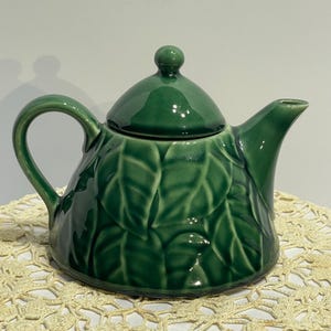 Vintage Pier 1 Imports embossed "Jade Leaves" pattern tea pot.