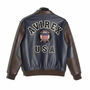 May include: A navy blue and brown leather jacket with the word "AVIREX" arched across the upper back. Below the word "AVIREX" is a patch with the American flag and the words "ALL AMERICAN" and "1973". The word "USA" is below the patch.