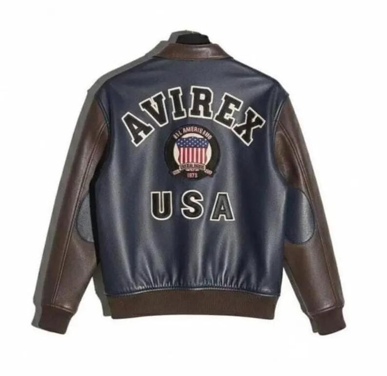 May include: A navy blue and brown leather jacket with the word "AVIREX" arched across the upper back. Below the word "AVIREX" is a patch with the American flag and the words "ALL AMERICAN" and "1973". The word "USA" is below the patch.