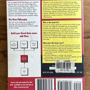May include: A red and yellow paperback book titled VBScript Programmer's Reference. The back cover features text describing the Wrox philosophy, target audience, and book contents, along with a barcode, ISBN 1-861002-71-8, and a price sticker.