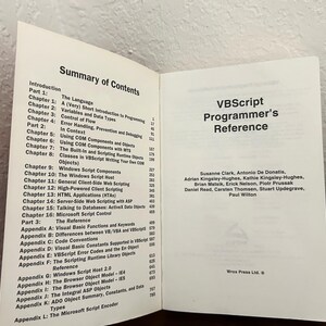 May include: An open book titled VBScript Programmer's Reference with black text on white pages. The left page displays a Summary of Contents listing chapters and appendices. The right page lists the authors and the Wrox Press Ltd. logo.