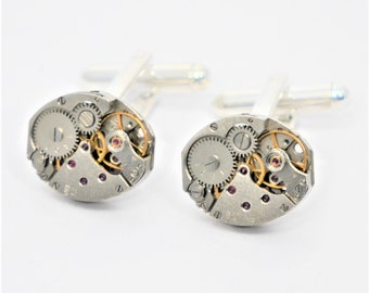 pequenas abotoaduras ovais para relógio - mecanismos de relógio vintage estilo steampunk em bases prateadas