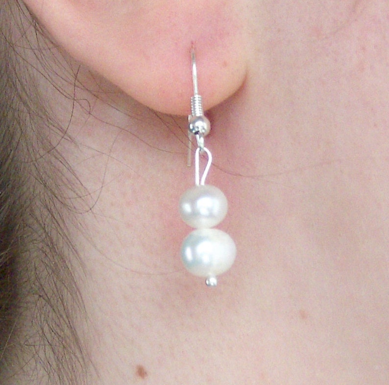 ivory white freshwater round pearl silver fish hook dangle earrings image 1