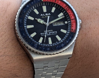 Seiko Alba Alarm Quartz Sports Y960-6021 ANA/Digi Pepsi-bezel vintage herenhorloge