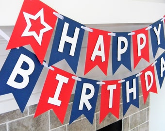 May include: Red and blue banner with white letters spelling "Happy Birthday".