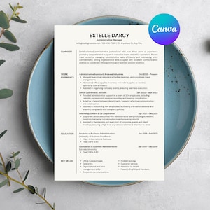May include: A resume titled "Estelle Darcy, Administrative Manager" on a light beige background. The resume is on a blue plate with a sprig of greenery and a white ribbon. The Canva logo is in the upper right corner.