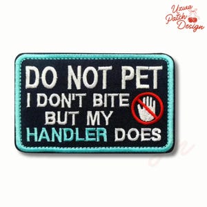May include: Embroidered patch with the text "DO NOT PET I DON'T BITE BUT MY HANDLER DOES" in white lettering on a black background. The patch has a teal border and a red circle with a hand symbol.