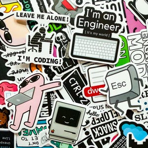 May include: A collection of colorful stickers with tech and coding themes. Designs include a keyboard, a computer monitor with a smiling face, and phrases like "I'm an Engineer" and "I'm Coding!" The stickers are a mix of black, white, pink, and green.