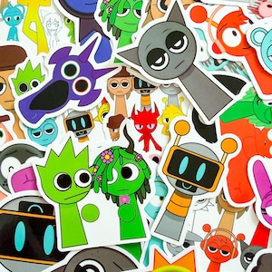 Op de afbeelding: Een verzameling kleurrijke cartoonkarakterstickers. De stickers hebben verschillende ontwerpen, waaronder robots, katachtige wezens en figuren met bloemaccenten. Het kleurenpalet omvat groen, paars, oranje en grijs, met witte randen.