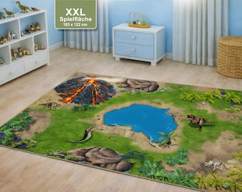 May include: XXL dinosaur-themed play rug, measuring 72 x 48 inches. The rug features a volcano, a blue lake, and various dinosaur illustrations. Green grass and brown rocks complete the prehistoric scene, perfect for a child's playroom.