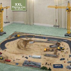 May include: A large play mat with a construction site theme, featuring a road, sand, and toy vehicles. Two yellow toy cranes stand on either side. The play area measures 72 x 48 inches.