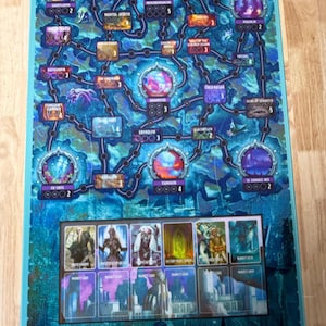 May include: A board game with a blue and purple map design, featuring interconnected locations and the text "TYRANTS OF THE UNDERDARK." Includes character cards and market cards, all with fantasy art.