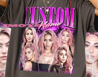 May include: Dark gray t-shirt featuring a graphic of a woman with pink hair and the text "CUSTOM Home" in pink. The design includes a collage of the woman's face and palm trees, with lightning bolt accents.