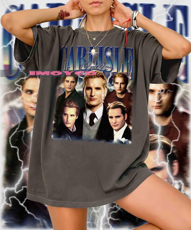 May include: Dark gray t-shirt featuring a collage of images and the text "CARLISLE Cullen" in a blue and white design. The shirt has a vintage, distressed look, with a faded graphic.