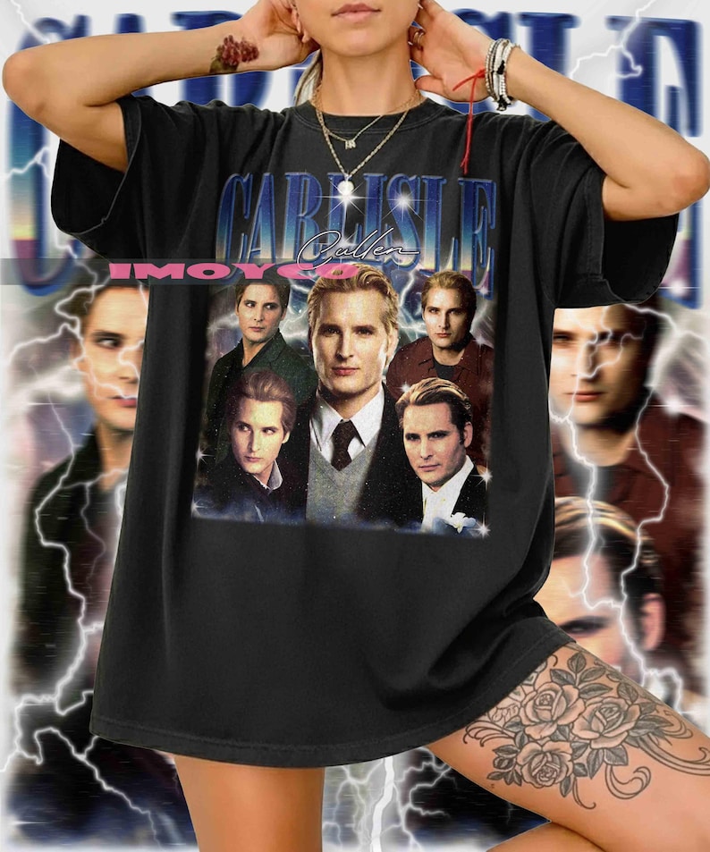 May include: Black graphic t-shirt featuring a collage of images and the text "CARLISLE Cullen" in a blue and white font. The shirt has a vintage style and a crew neck.