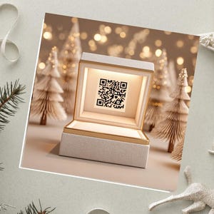 May include: A white gift box with a gold interior, displaying a QR code. The box is open, illuminated, and set against a backdrop of miniature Christmas trees and bokeh lights. Festive holiday theme.