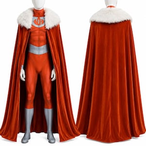 May include: A red superhero costume with a matching cape. The costume includes a red jumpsuit, silver boots, and a silver belt. The cape has a white fur collar. The costume is displayed on a mannequin.