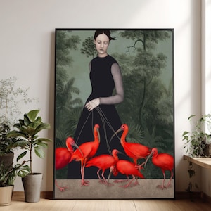 Peut inclure: Impression d'art encadrée représentant une femme en robe noire avec des oiseaux rouges. Les oiseaux sont au premier plan, et l'arrière-plan montre une forêt verte. L'œuvre a un style surréaliste et artistique.